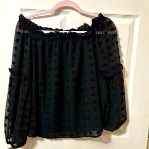 Black off/ on shoulder blouse. Lined .